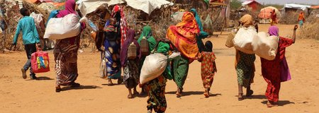 Families in Somalia leave their villages in search of assistance.